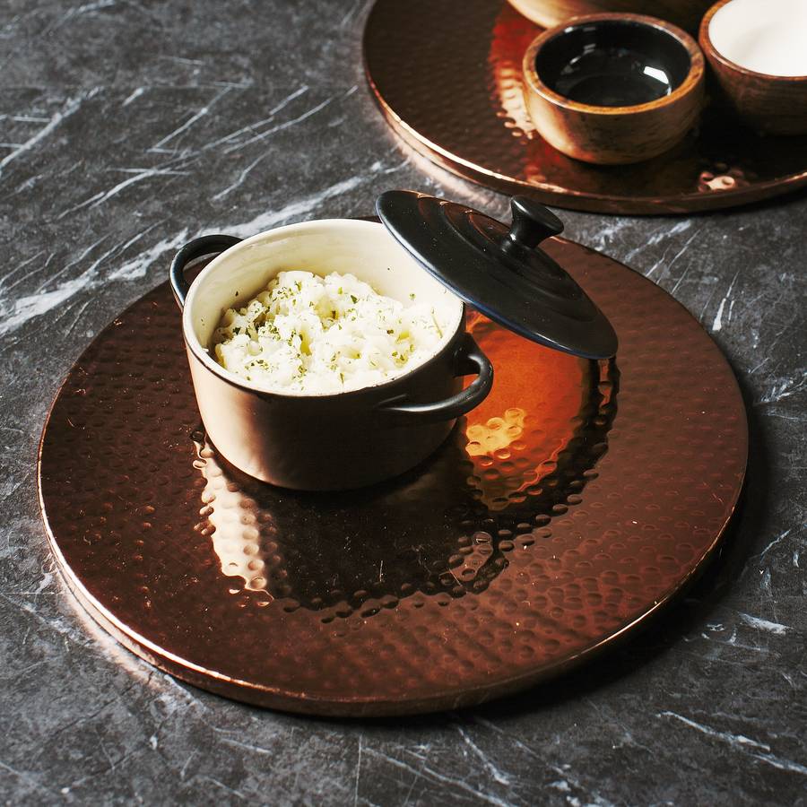 copper hammered placemats by marquis & dawe