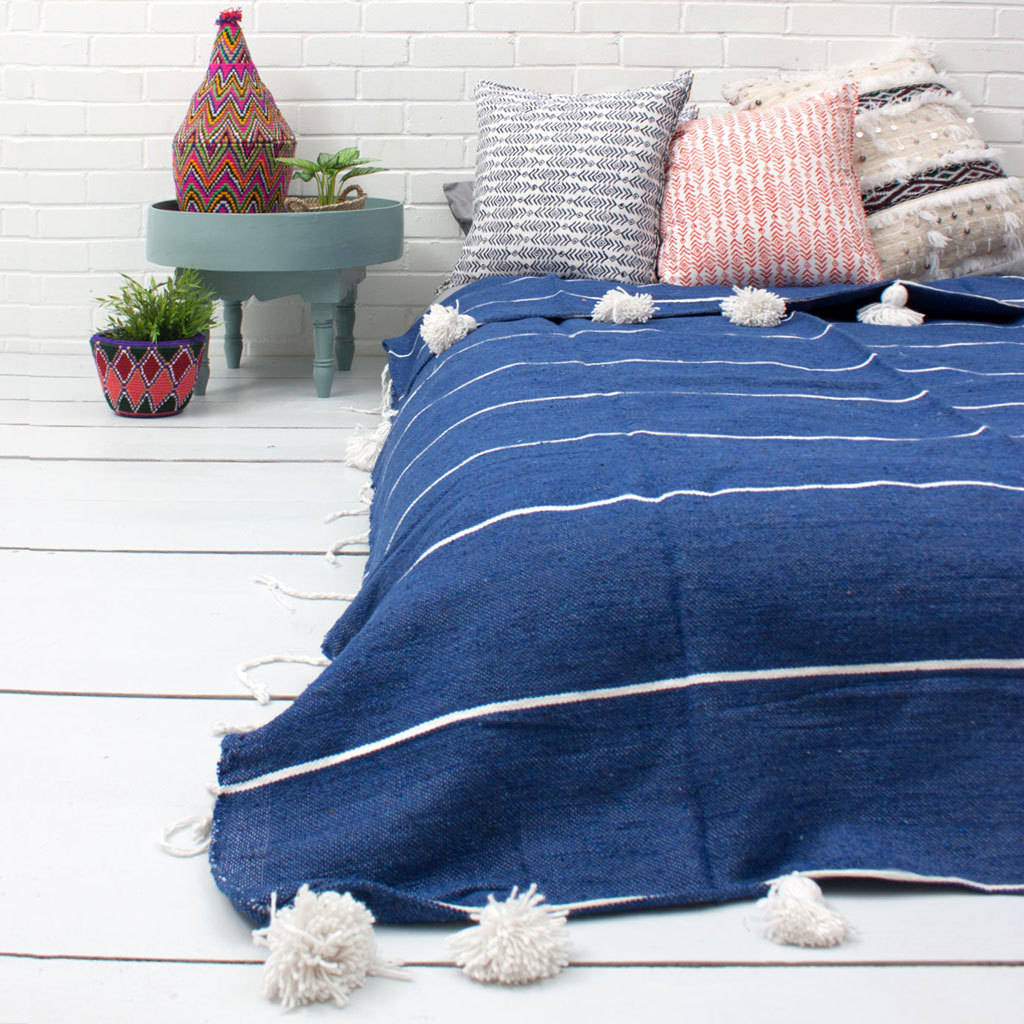 moroccan handwoven tassel stripe pom pom blanket by bohemia
