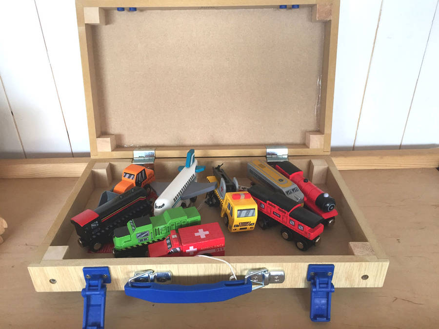 personalised train carry case with trains by oskar & catie