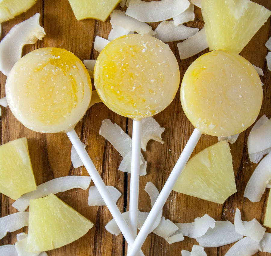 five alcoholic piña colada lollipops by holly's lollies