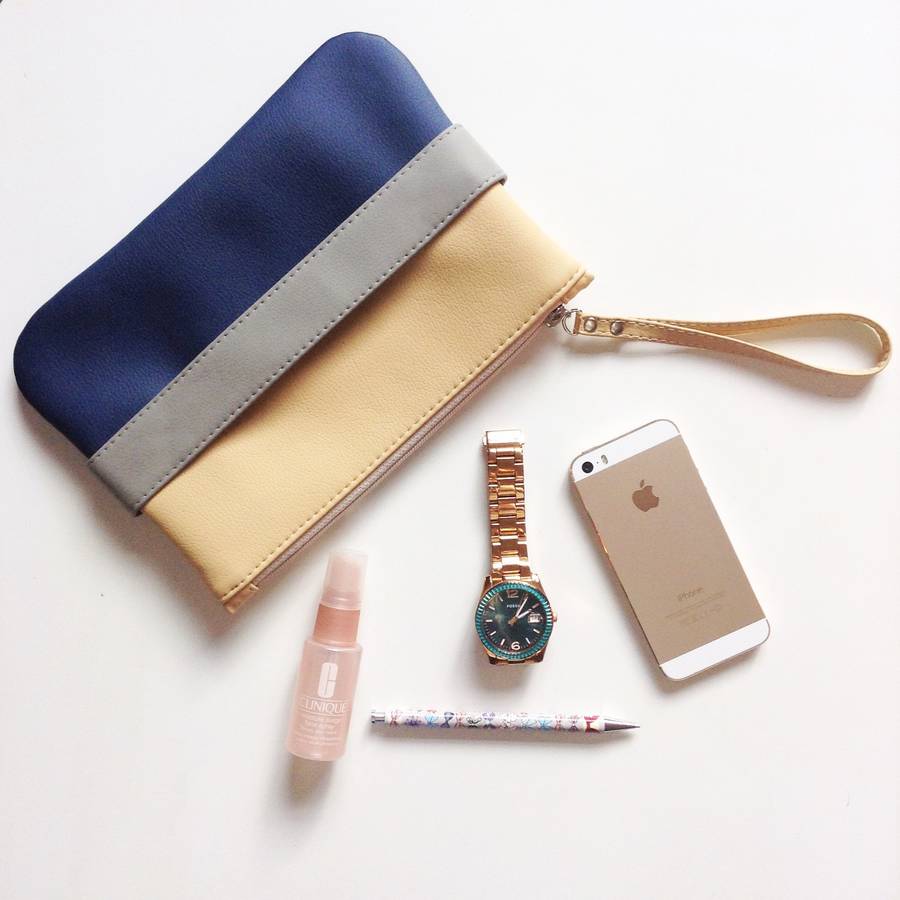 beige and navy vegan leather clutch bag by iamia