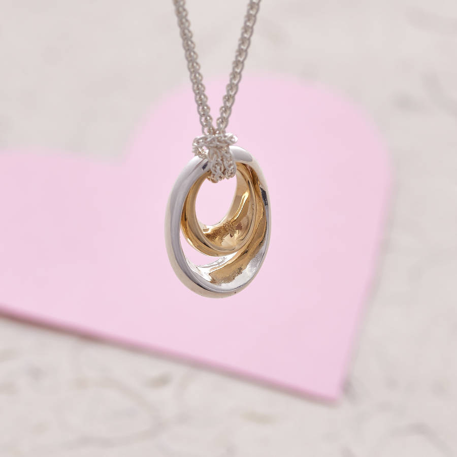 solid silver and gold mother and baby necklace by scarlett jewellery