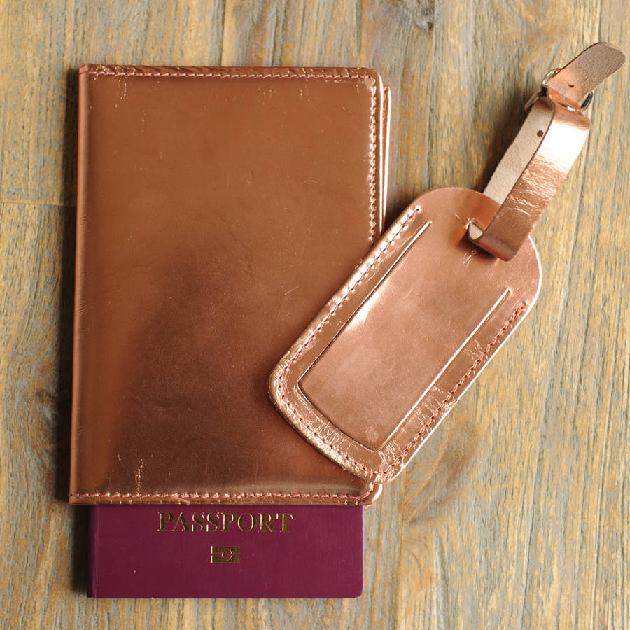 metallic leather passport cover and luggage label by undercover