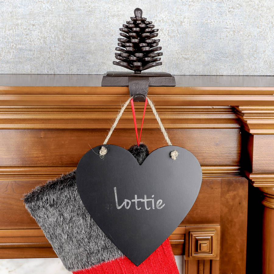 cast iron pine cone christmas stocking holder by dibor