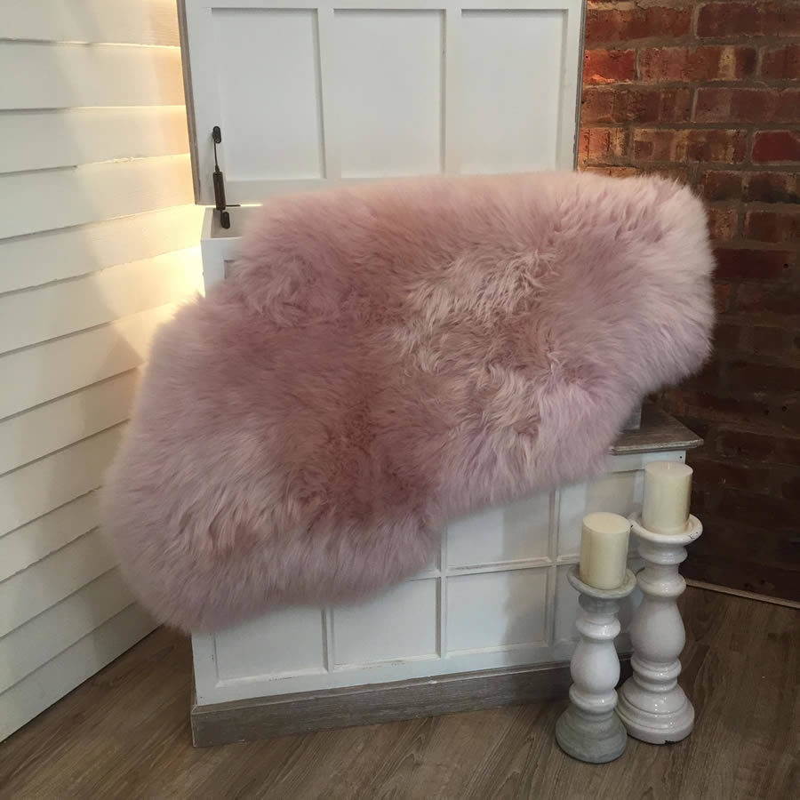 luxury powder pink sheepskin rugs by cowshed interiors