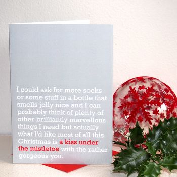 'a kiss under the mistletoe' christmas card by the right lines | notonthehighstreet.com