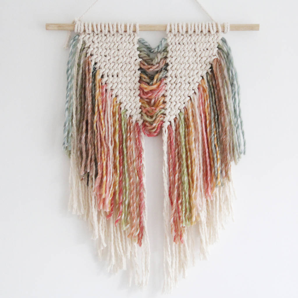 rainbow macrame wall hanging by tent living