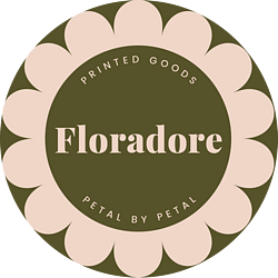 Floradore logo featuring a soft pink flower and the word Floradore set against a moss green background.