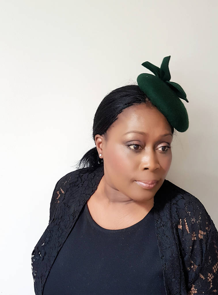 green felt hat by the head bloomer