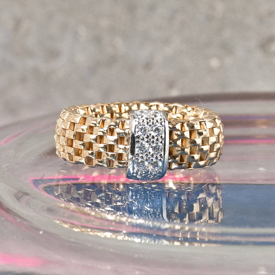 gold stretch ring with zircons by loel & co.