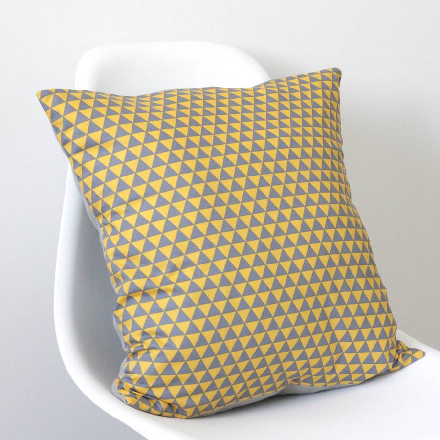 geometric yellow and grey triangles cushion cover by quirkybee