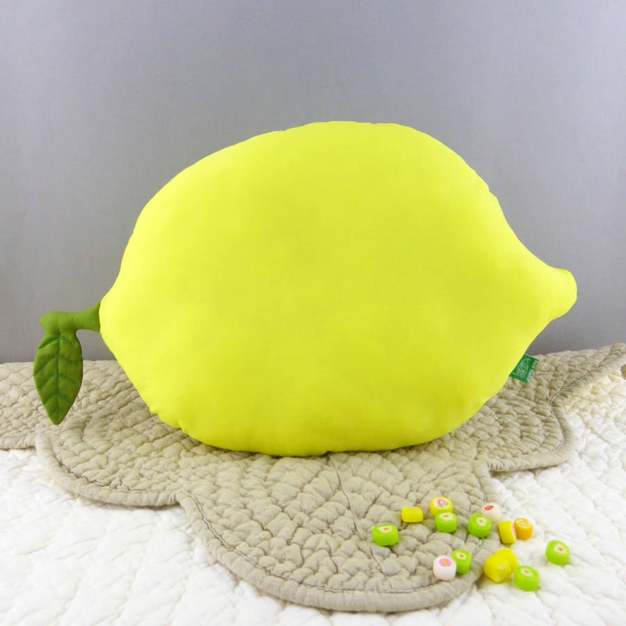 lemon shaped throw pillow by petit mushyp