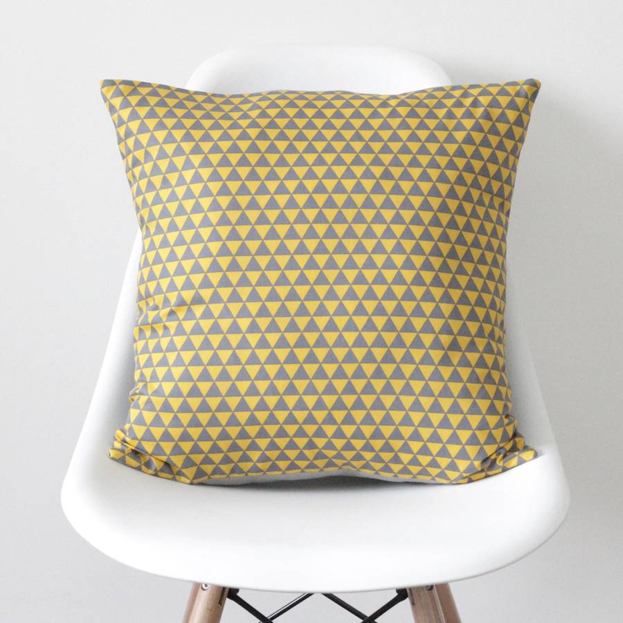 geometric yellow and grey triangles cushion cover by quirkybee