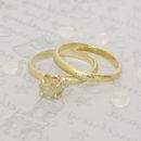 18 carat gold textured wedding ring by caroline brook