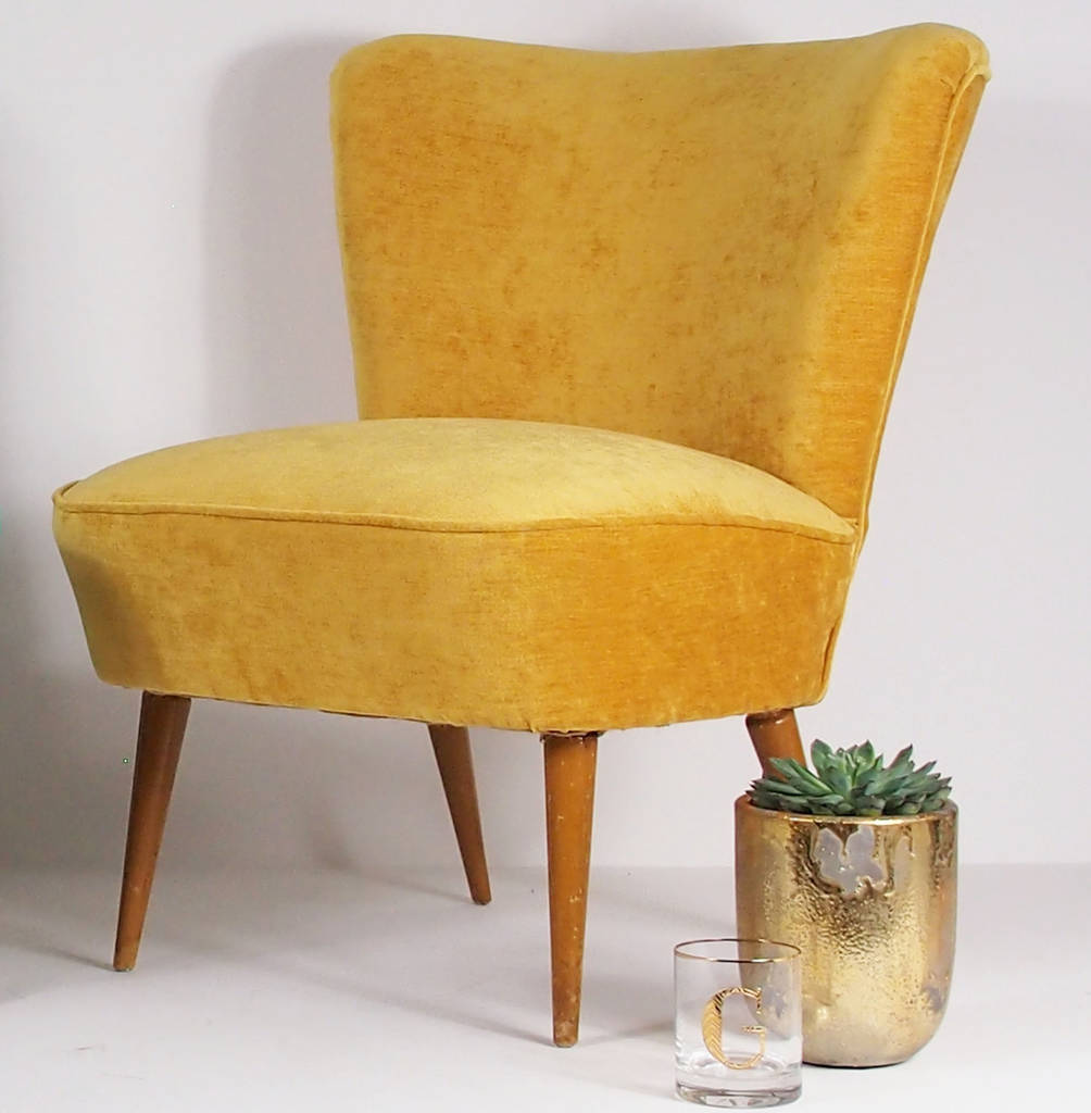 the bartholomew cocktail chair in dandelion yellow by galapagos