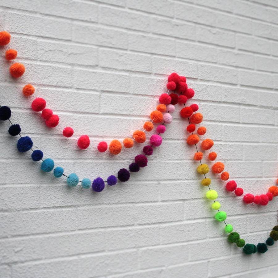 multicoloured pom pom bunting garland by get it rapt
