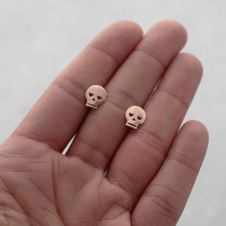 skull stud earrings by dainty edge jewellery