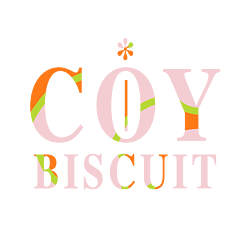 Coy Biscuit logo in orange, green and pink