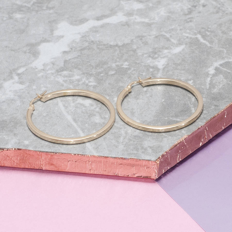 gold, rose gold and silver hoop earrings by loel & co