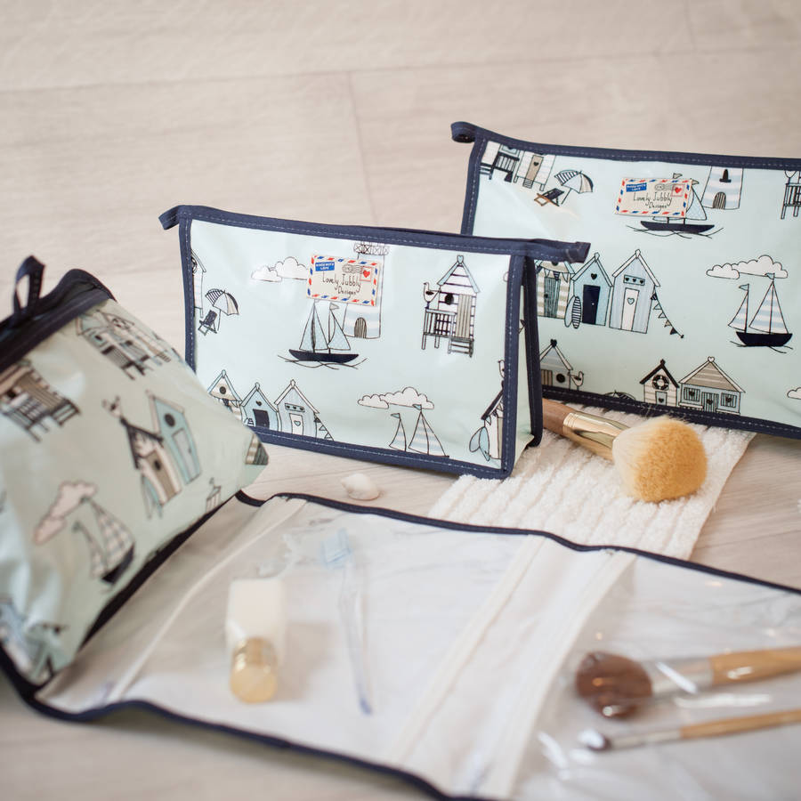 beach huts bunting nautical hanging toiletry wash bag by lovely jubbly