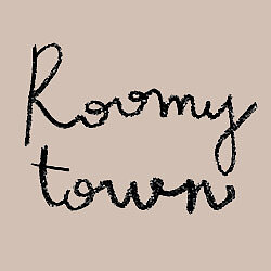 Roomytown Logo on Pink Square
