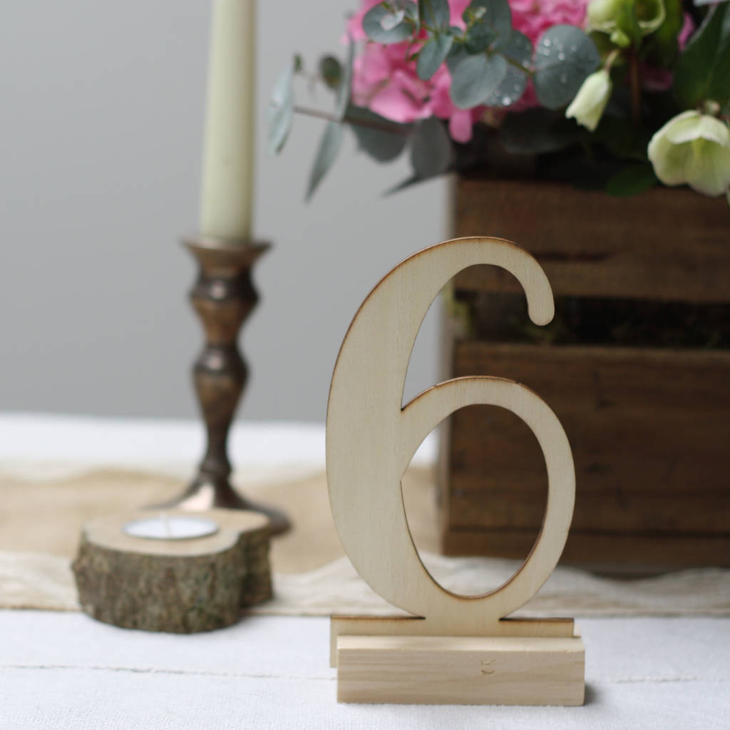 wooden-calligraphy-table-numbers-by-the-wedding-of-my-dreams-notonthehighstreet