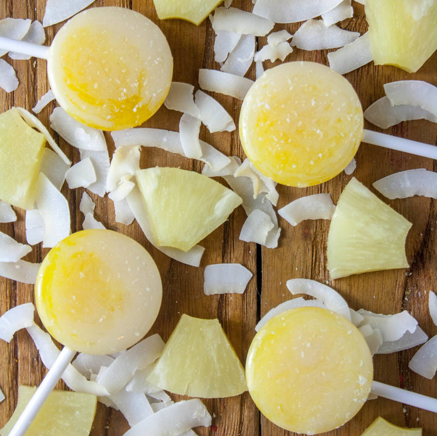 five alcoholic piña colada lollipops by holly's lollies
