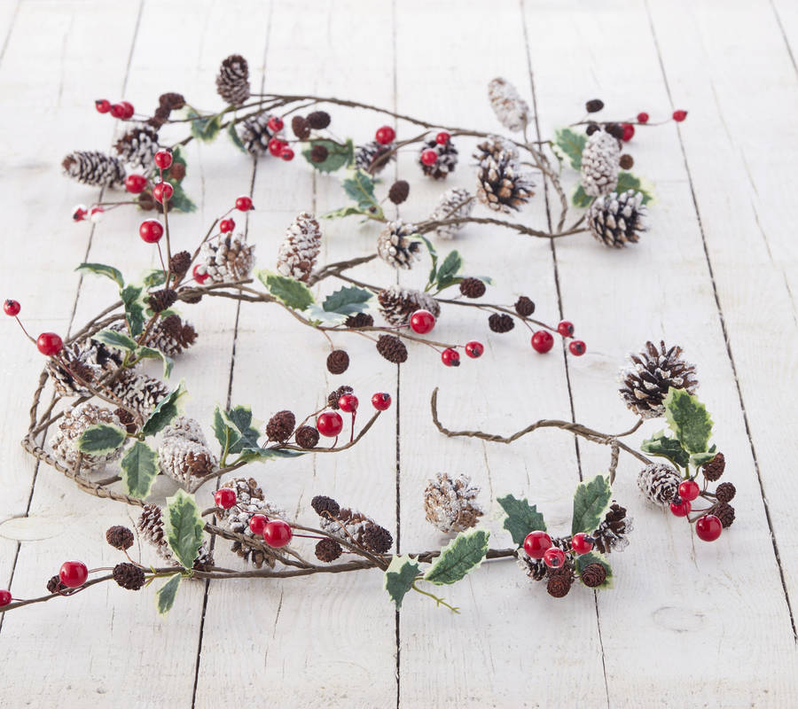 cone and red berry christmas garland by the christmas home | notonthehighstreet.com