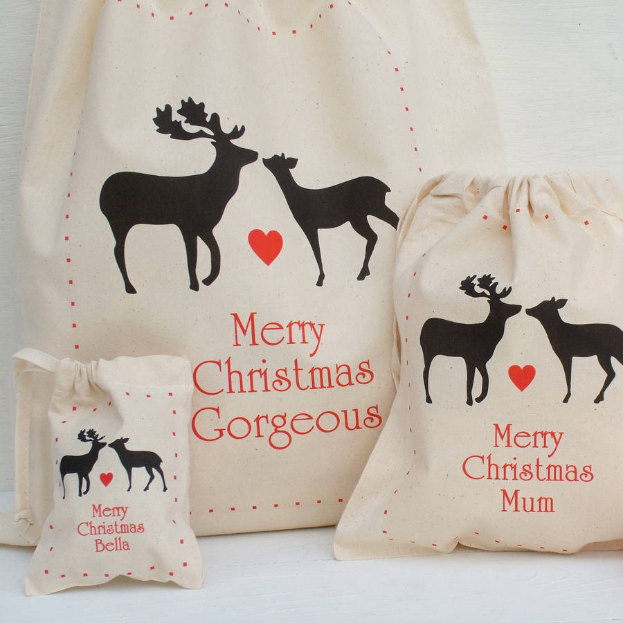 personalised christmas reindeer gift bags by seahorse | notonthehighstreet.com - original_personalised-christmes-reindeer-gift-bags