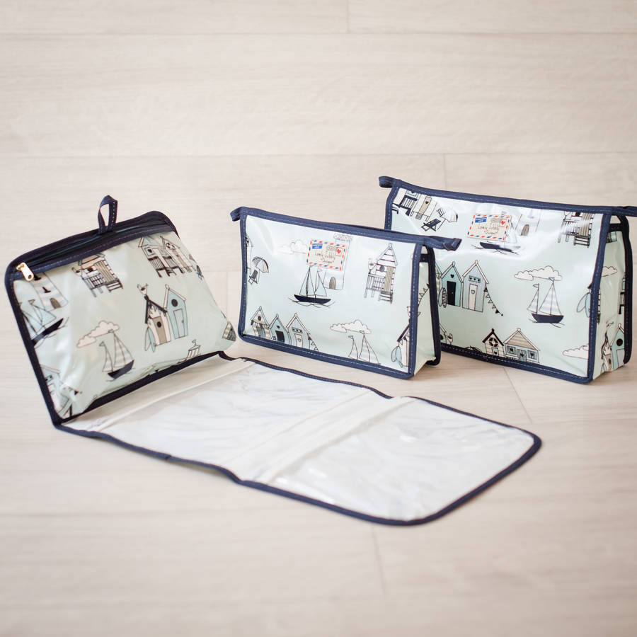 beach huts bunting nautical hanging toiletry wash bag by lovely jubbly