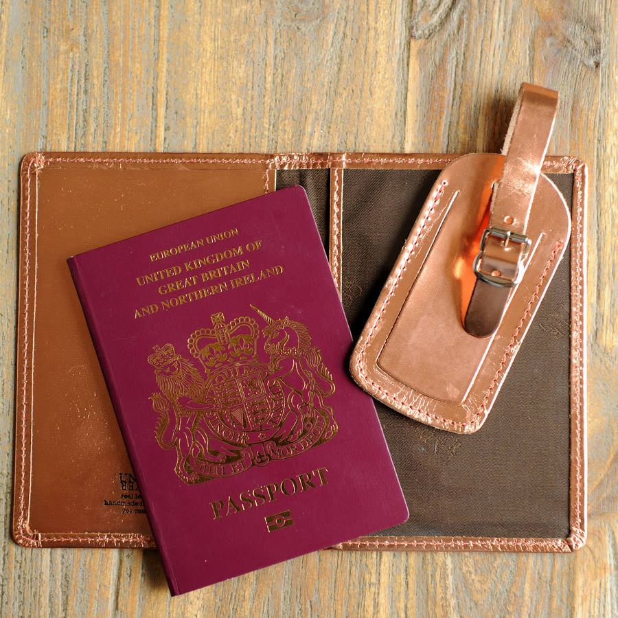 metallic leather passport cover and luggage label by undercover
