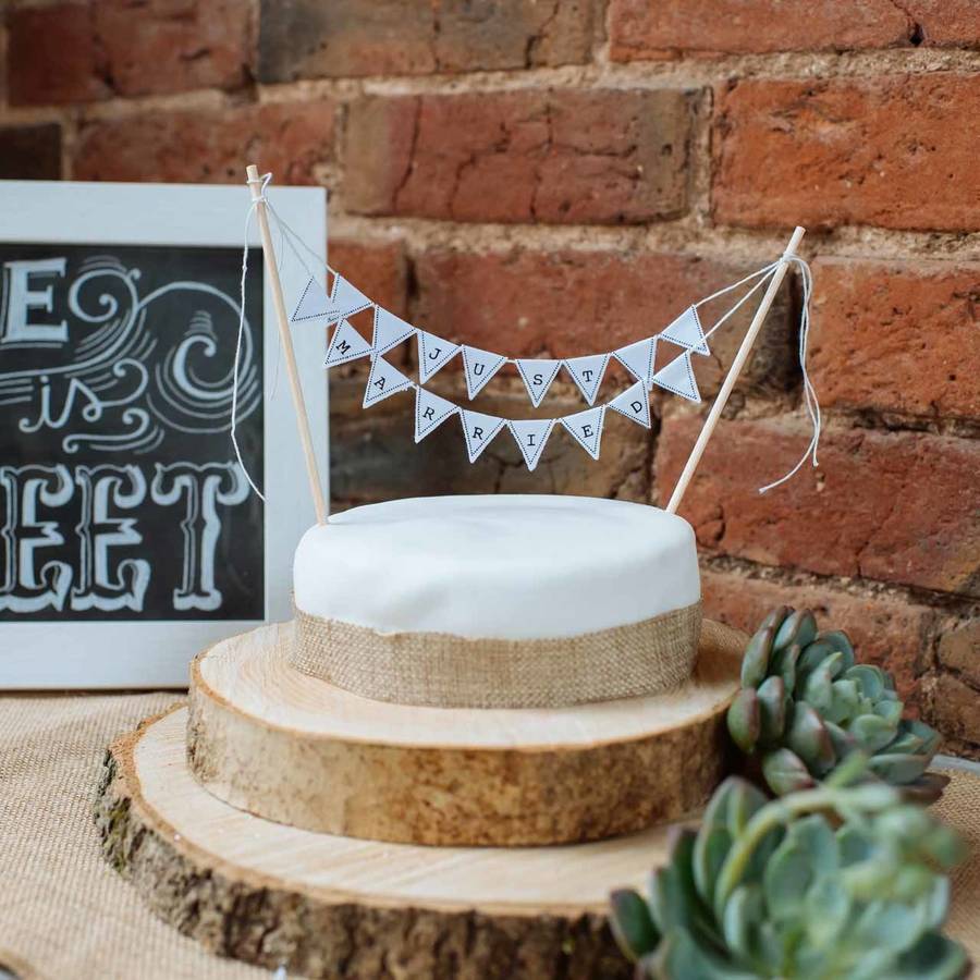 wooden tree slice wedding centrepiece or cake stand by the