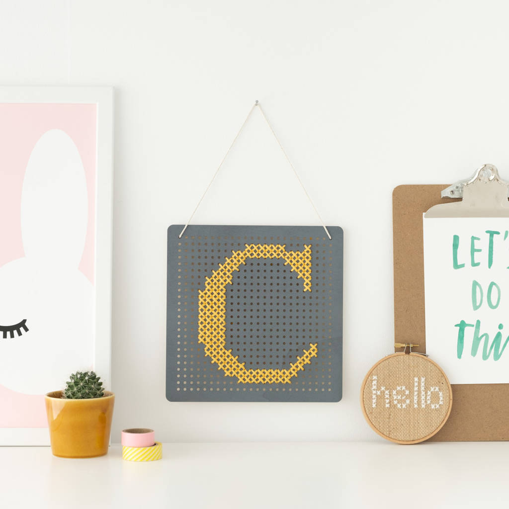 grey cross stitch pegboard by cotton clara