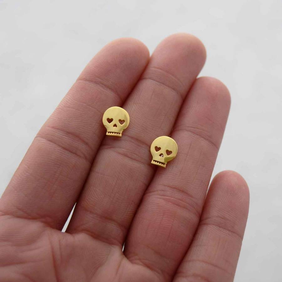 skull stud earrings by dainty edge jewellery
