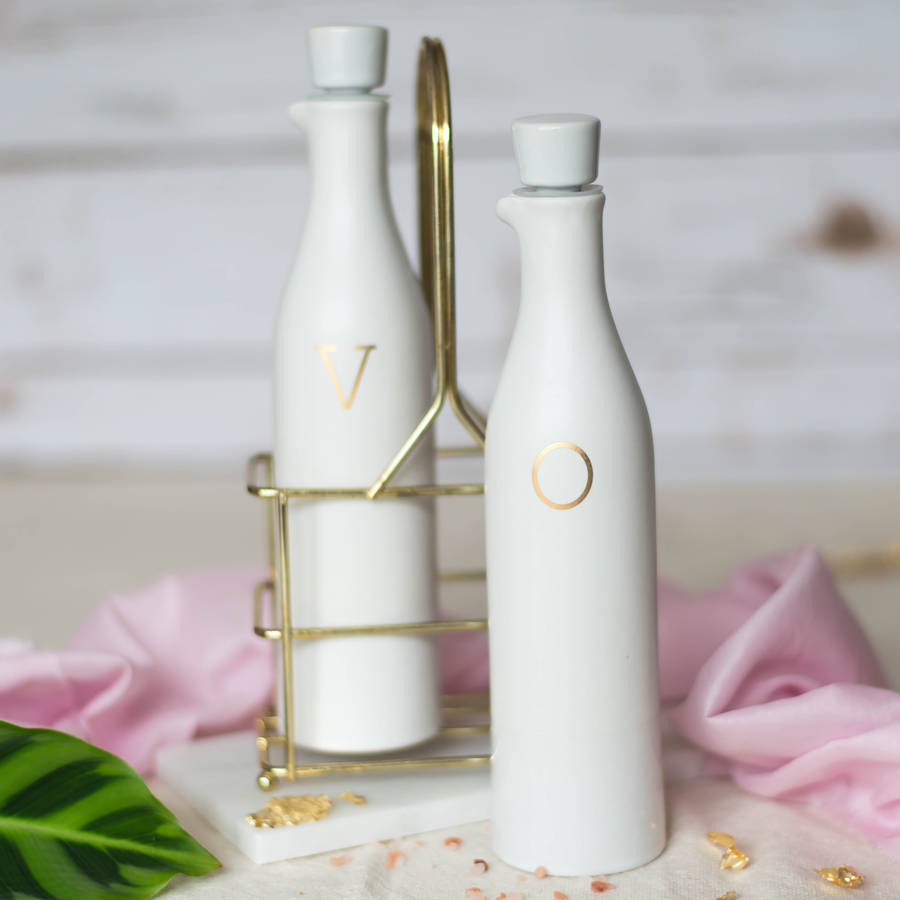 white ceramic oil and vinegar set by iamia