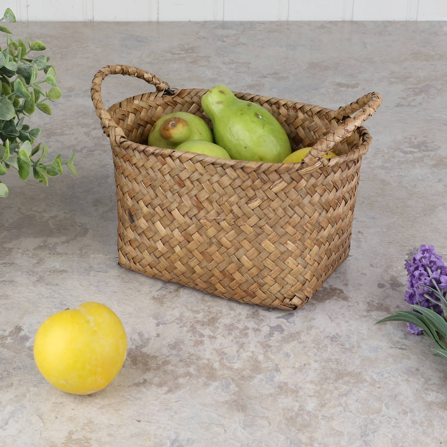 set of four oval wheat straw baskets by dibor