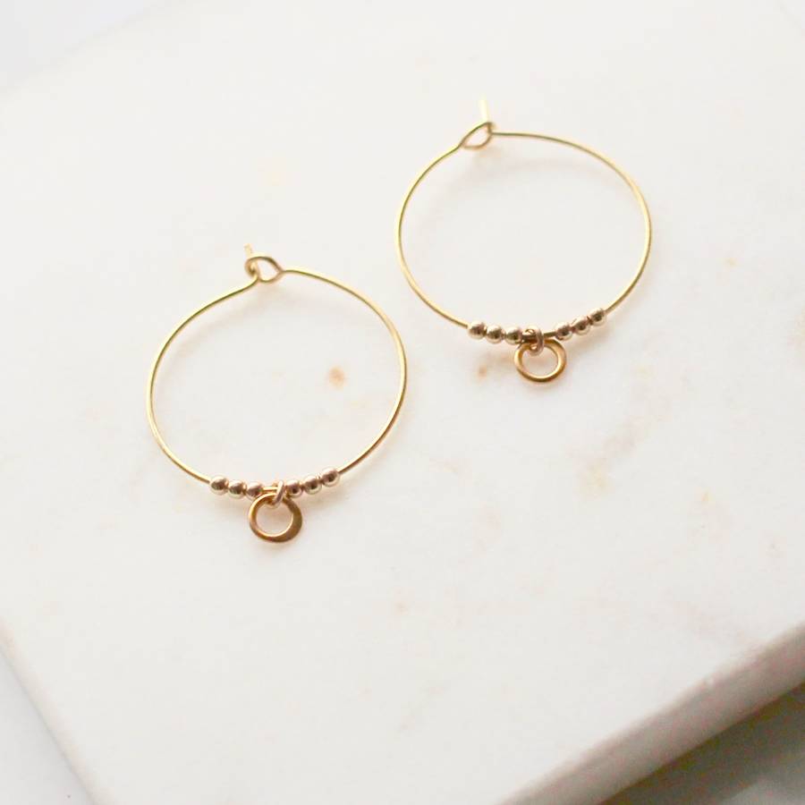 beaded gold hoop earrings by a box for my treasure