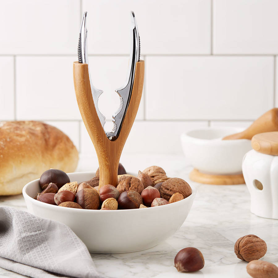 wooden nutcracker and bowl by the christmas home