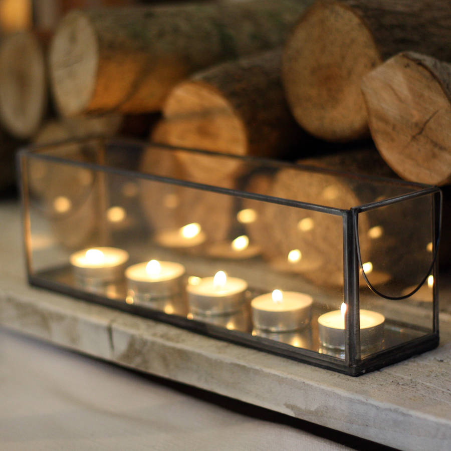 long glass and mirror tea light holder with metal frame by the wedding