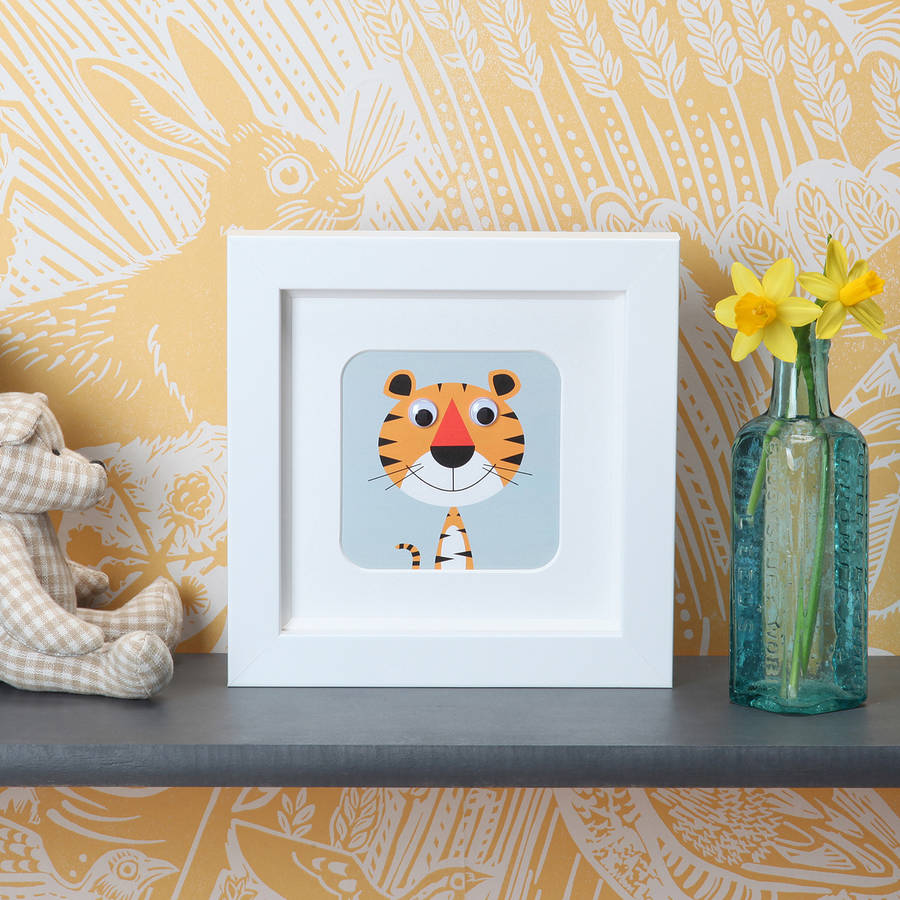 wobbly eyed animal framed nursery prints by stripeycats