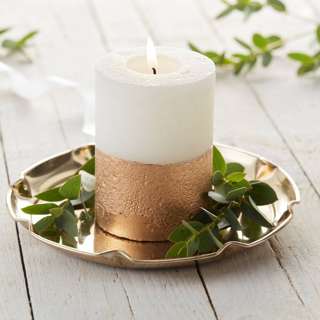 gold candle by the contemporary home