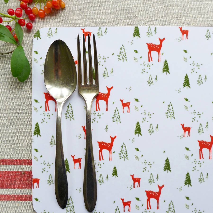 set of four christmas reindeer placemats by charlotte macey