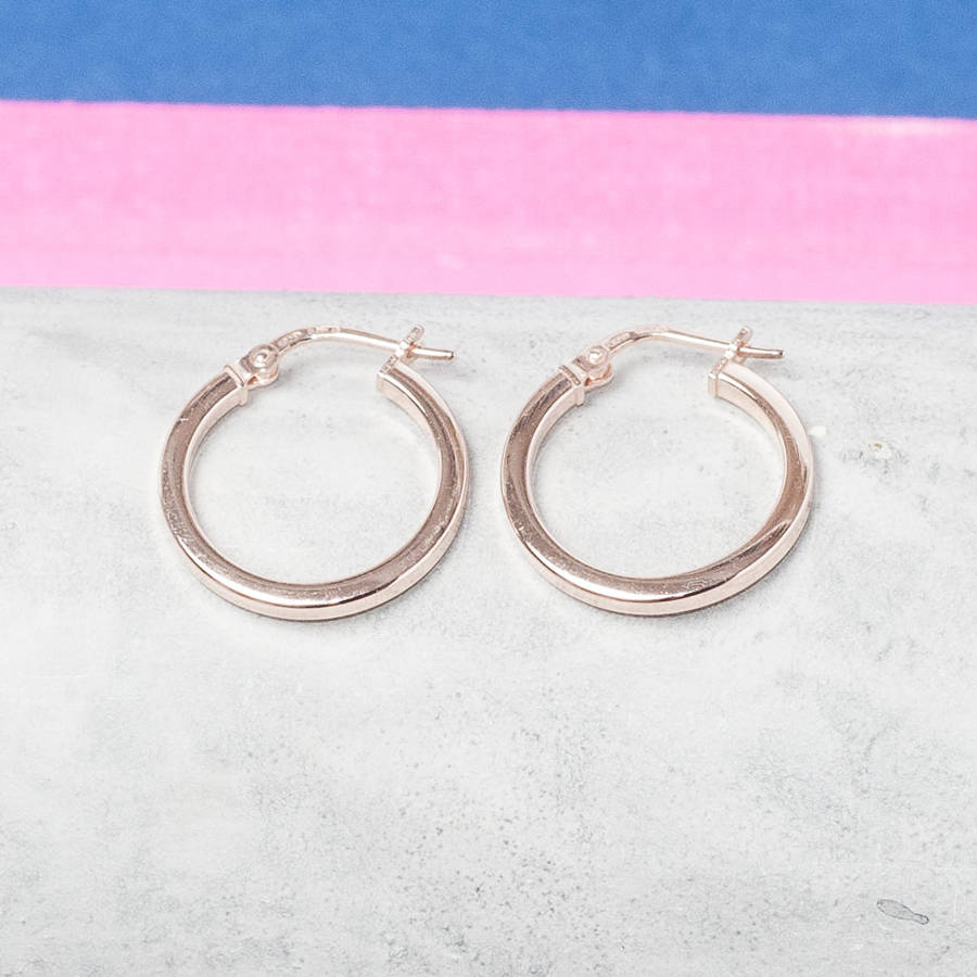 gold, rose gold and silver hoop earrings by loel & co