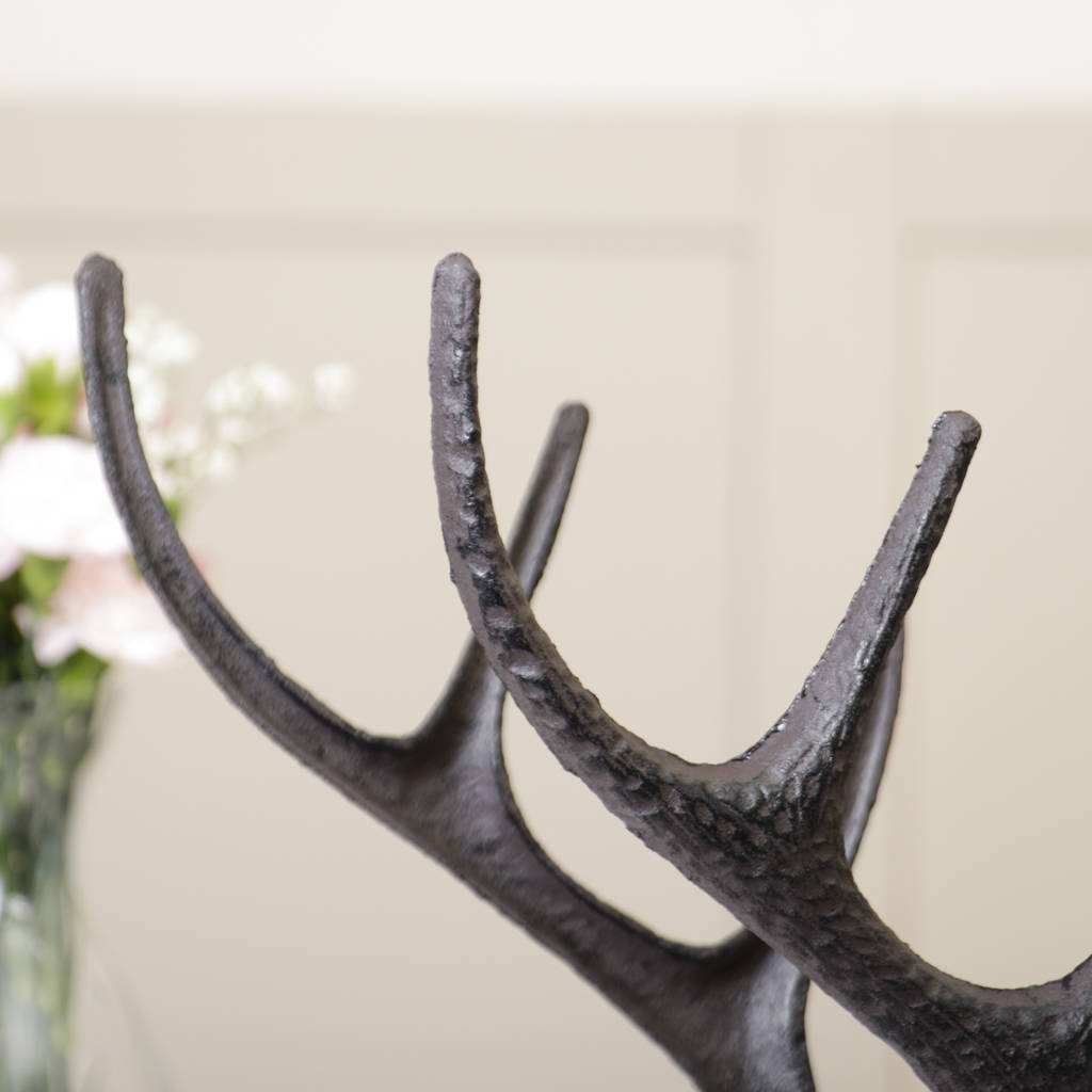 cast iron antler wine rack by dibor