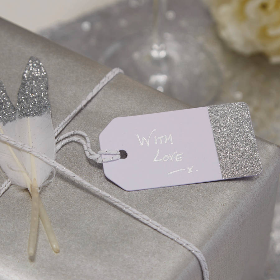 white and silver glitter luggage tags by ginger ray