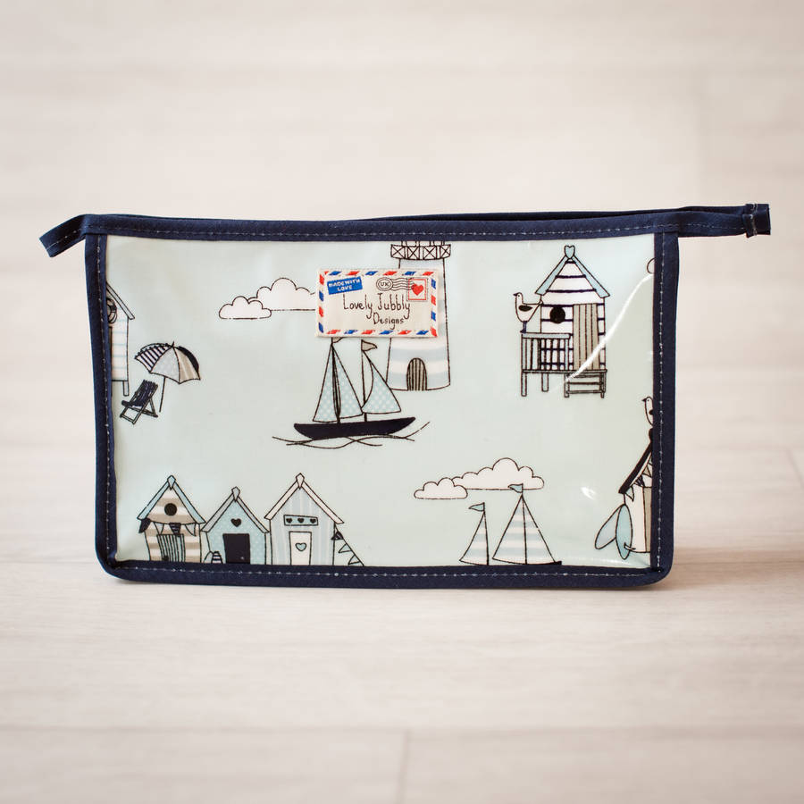 beach huts bunting nautical hanging toiletry wash bag by lovely jubbly