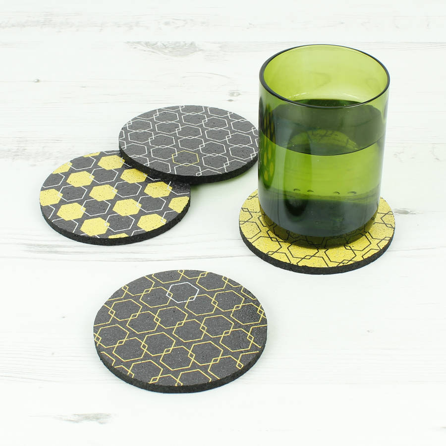 set of four recycled rubber coasters by green tulip ethical living