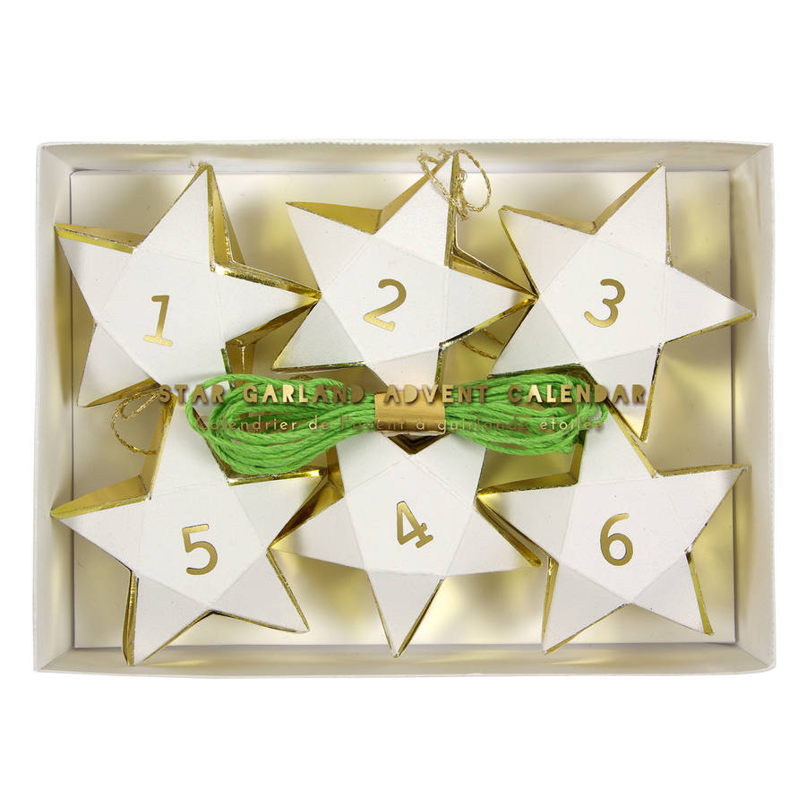 star shaped hanging advent calendar by thelittleboysroom