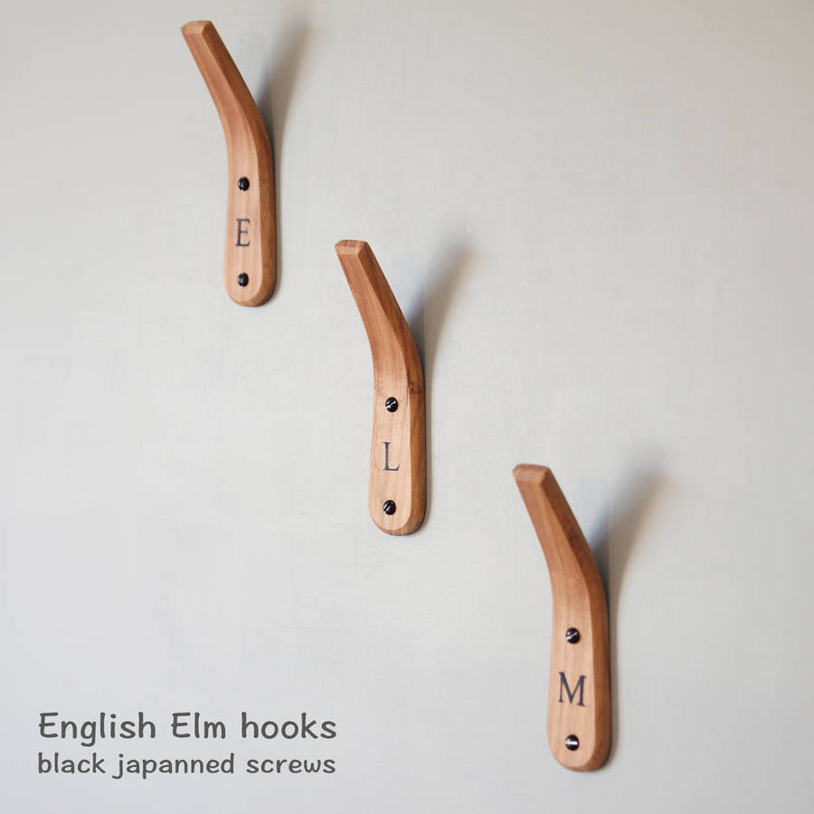 personalised wooden coat hooks with branded letters by layertree
