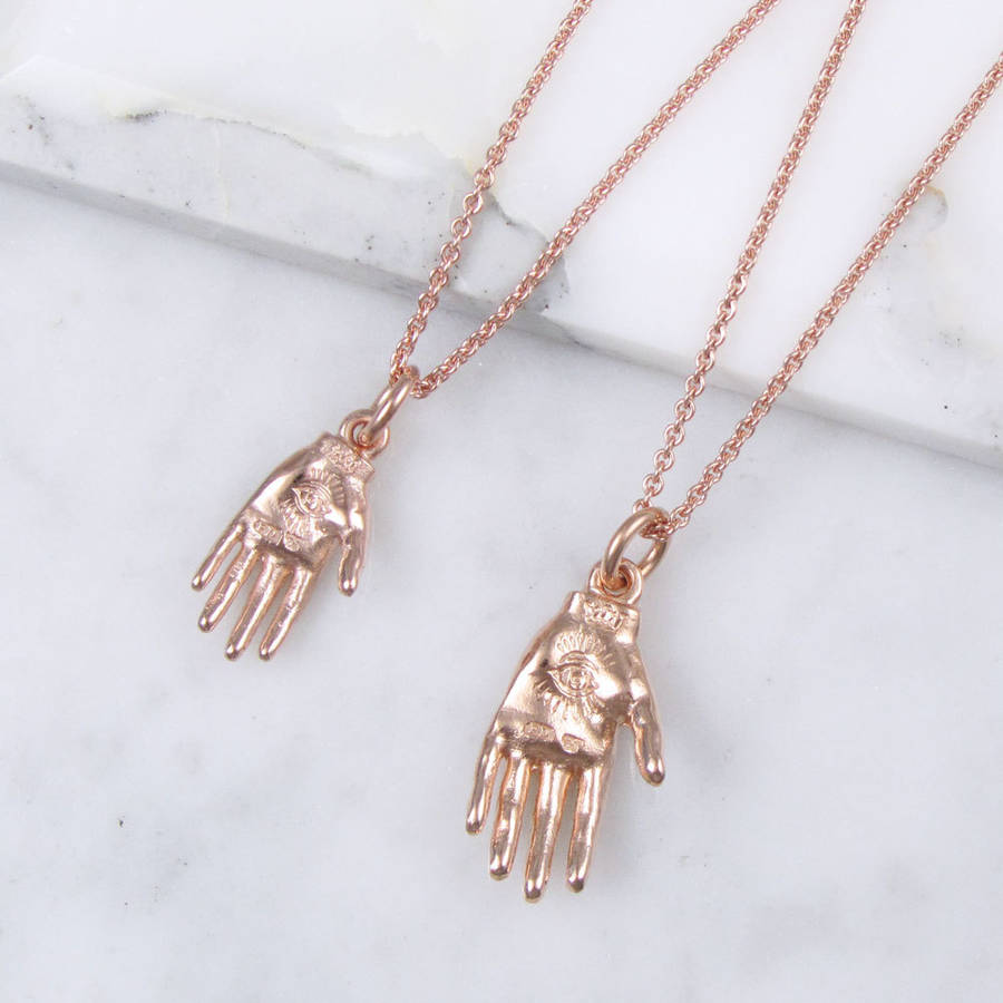 hand necklace by black pearl